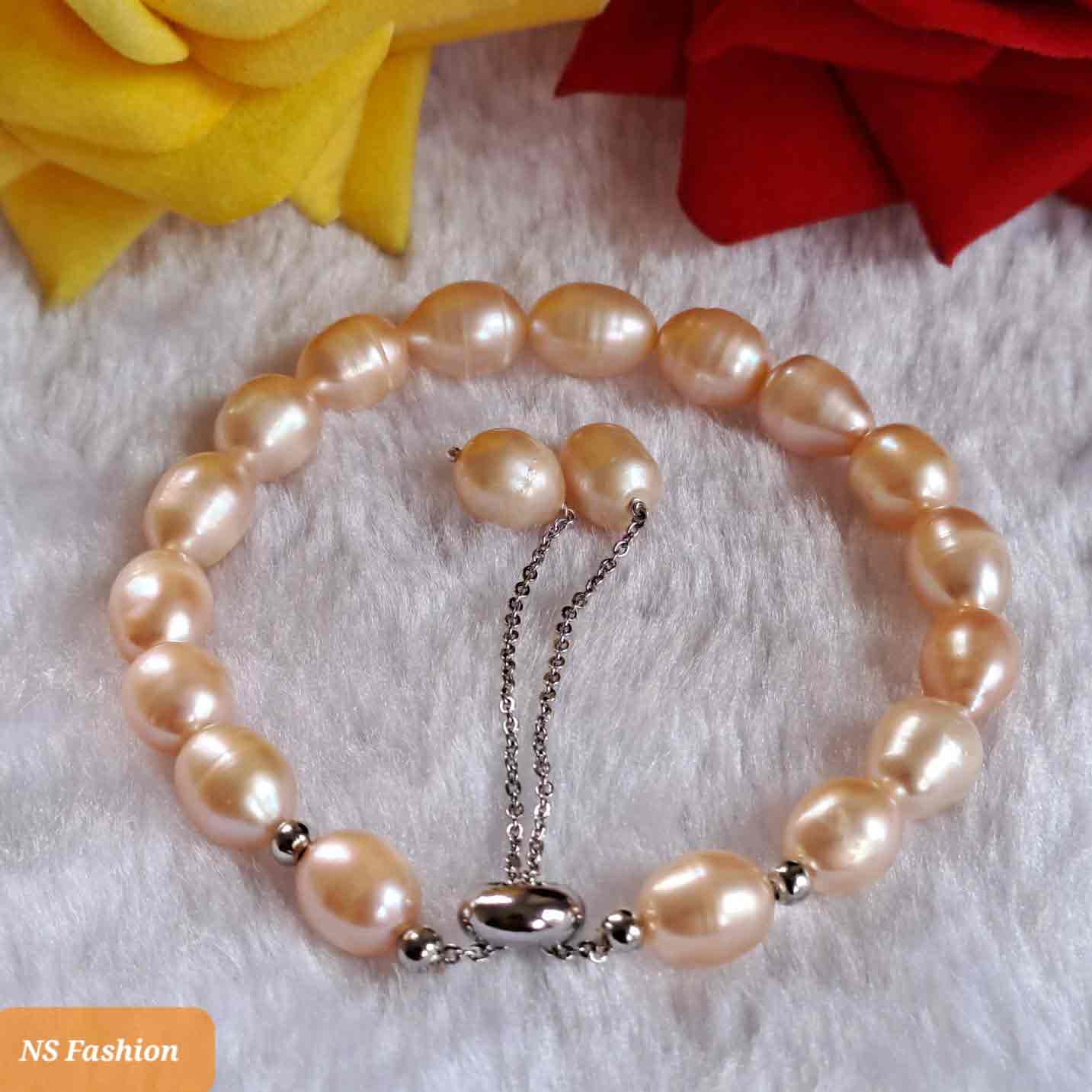 pink-color-rice-pearl-silver-metal-adjustable-bracelet Pink Color Rice Pearl Silver Metal Adjustable Bracelet - Image 1