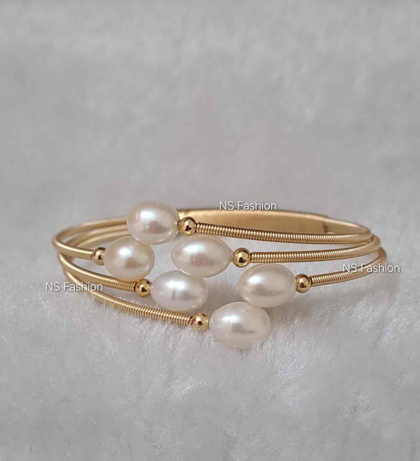 six-piece-rice-white-color-pearl-adjustable-bracelet Six Pieces White Color Rice Pearl Adjustable Bracelet - Image 1