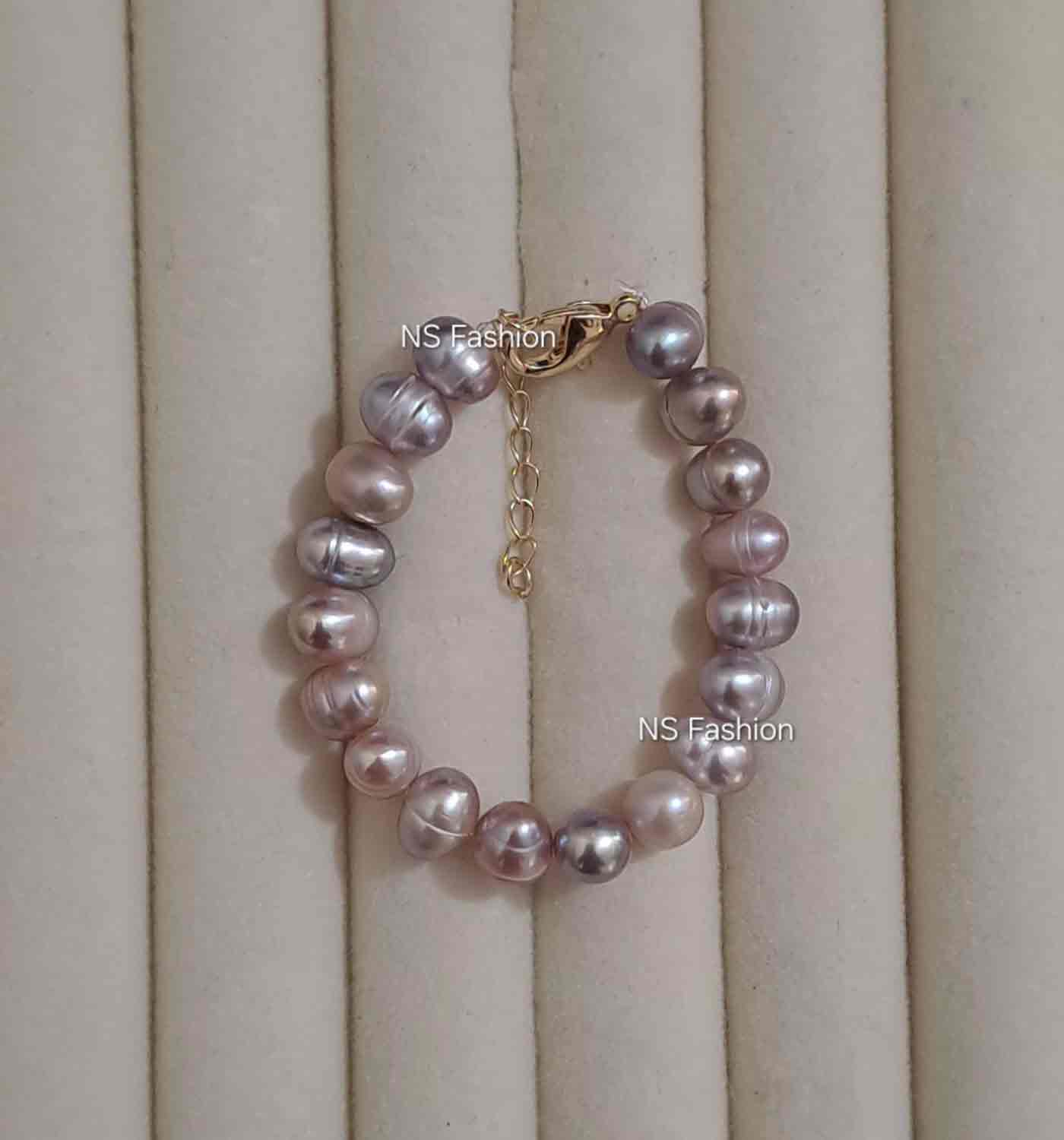 baby-bracelet-purple-color-pearl Purple Color Pearl Adjustable Baby Bracelet - Image 1