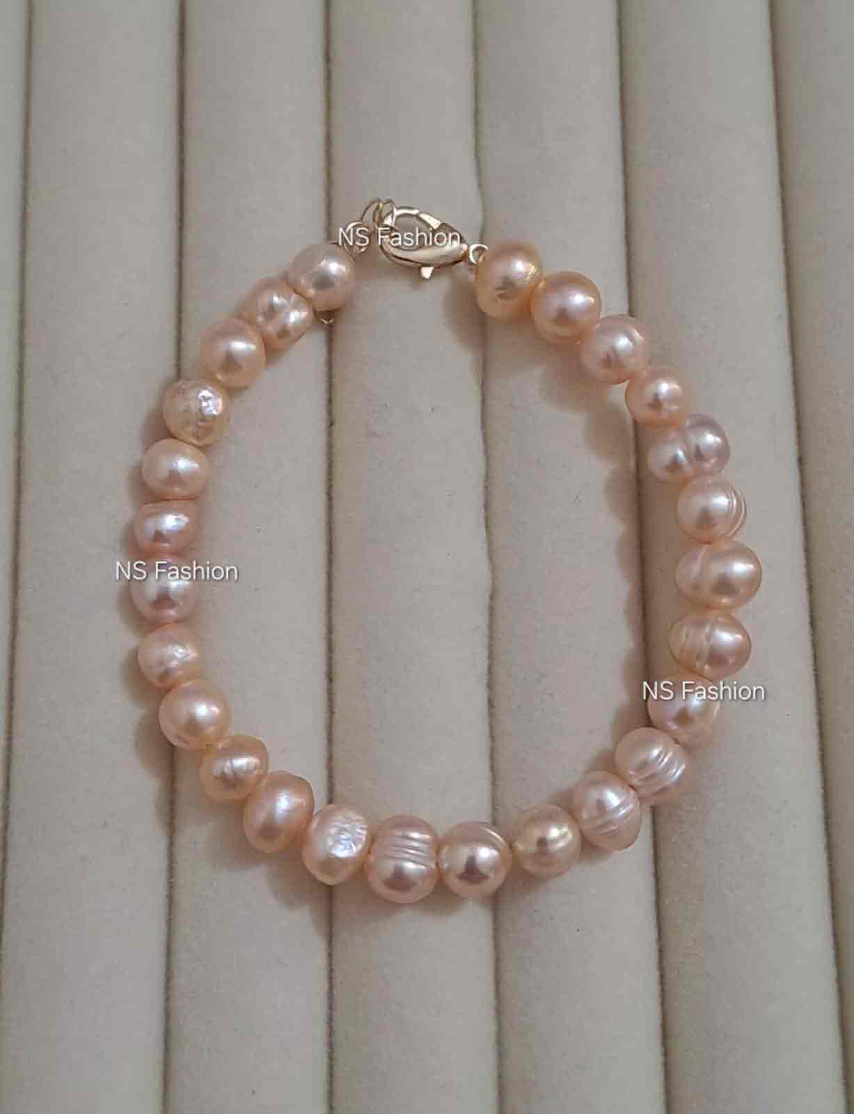 pink-color-pearl-adjustable-bracelet 100% Original Pink Color Pearl Adjustable Bracelet - Image 1
