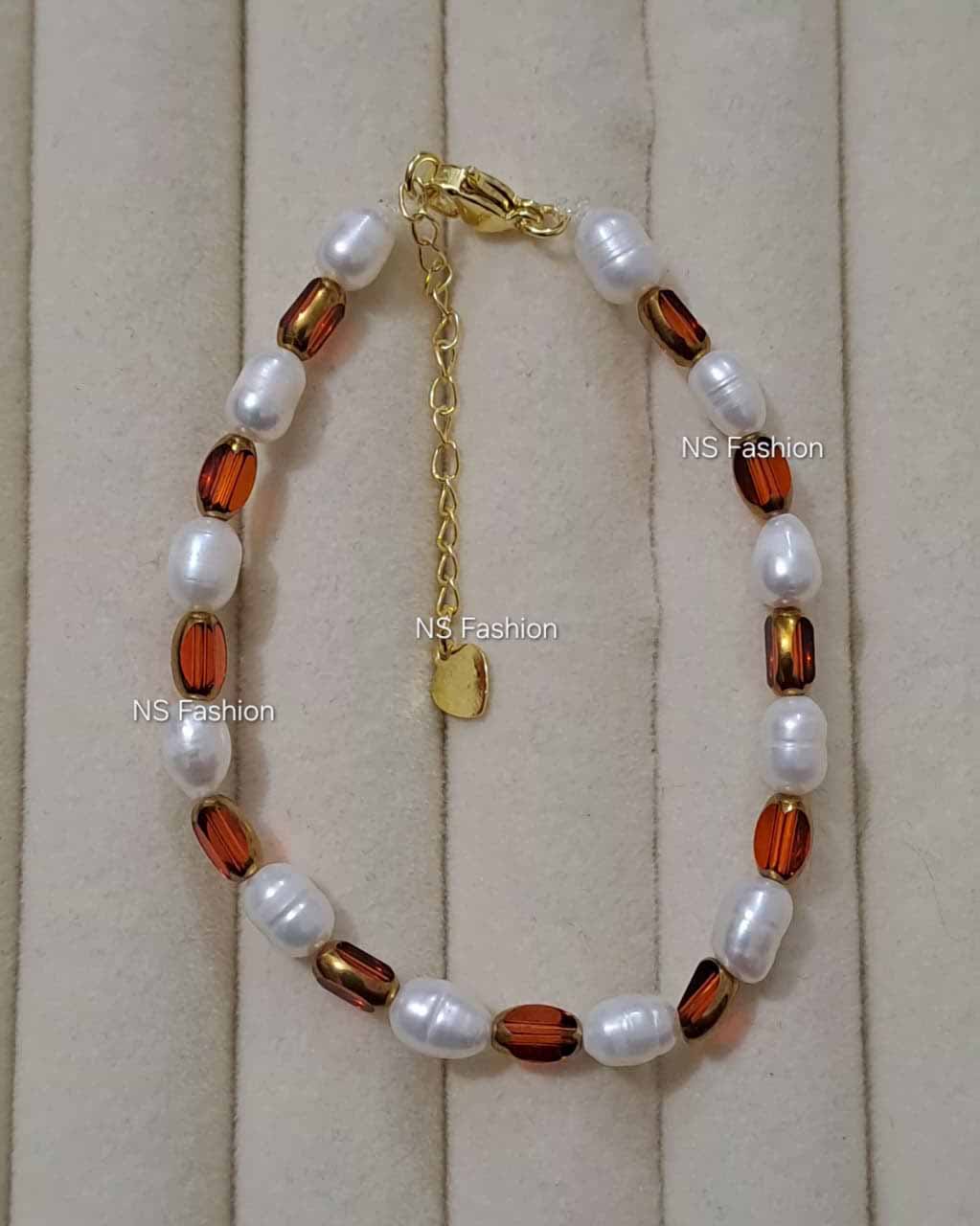 white-color-rice-pearl-and-stone-bracelet White Color Rice Pearl and Stone Bracelet - Image 1